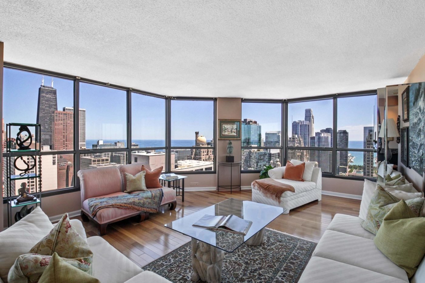 Real estate picture of a living room with amazing views in an apartment for sale